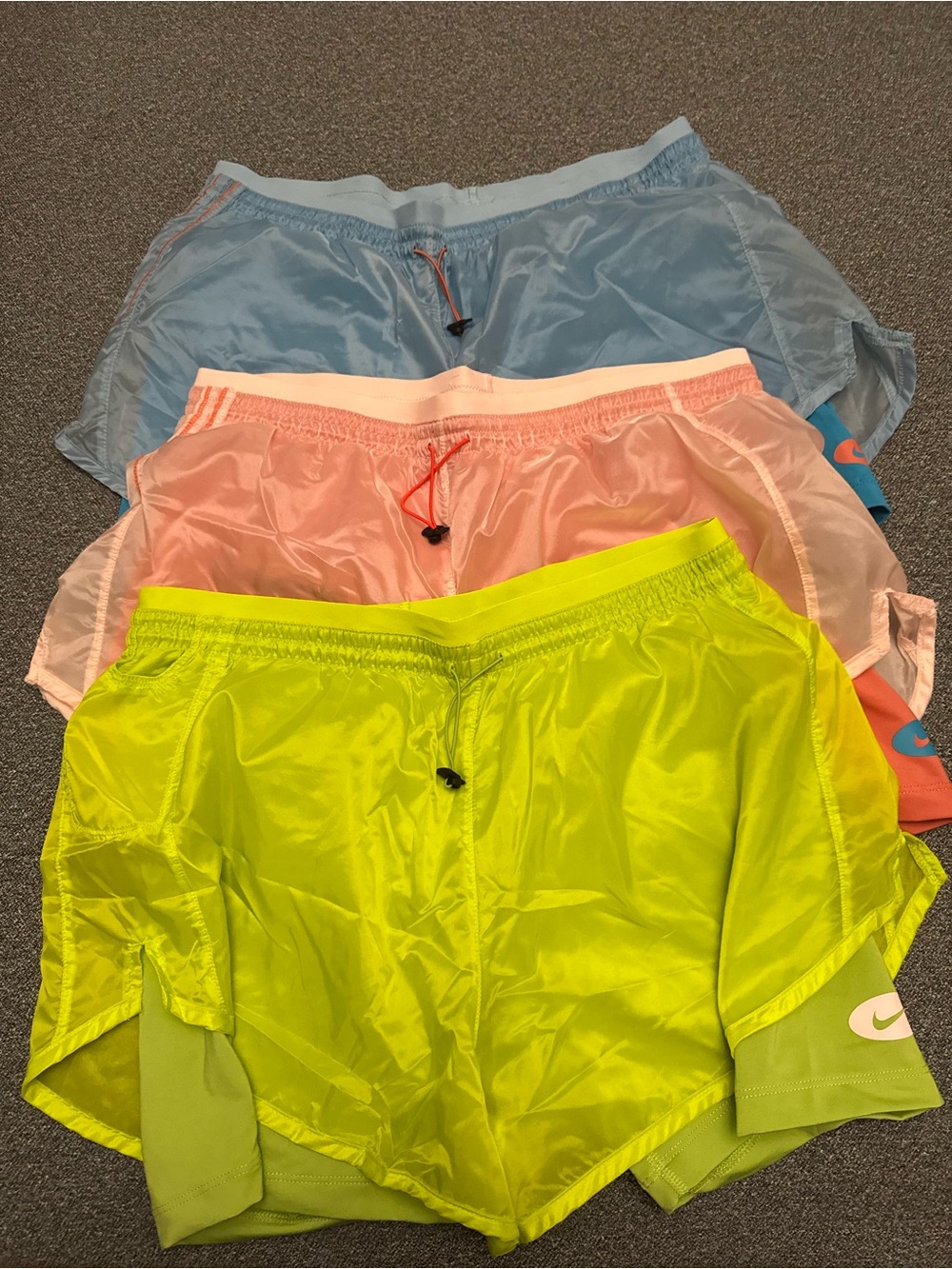3 pairs Nike Woman Bright Neon Yellow, Peach & Light Blue Athletic Shorts Set